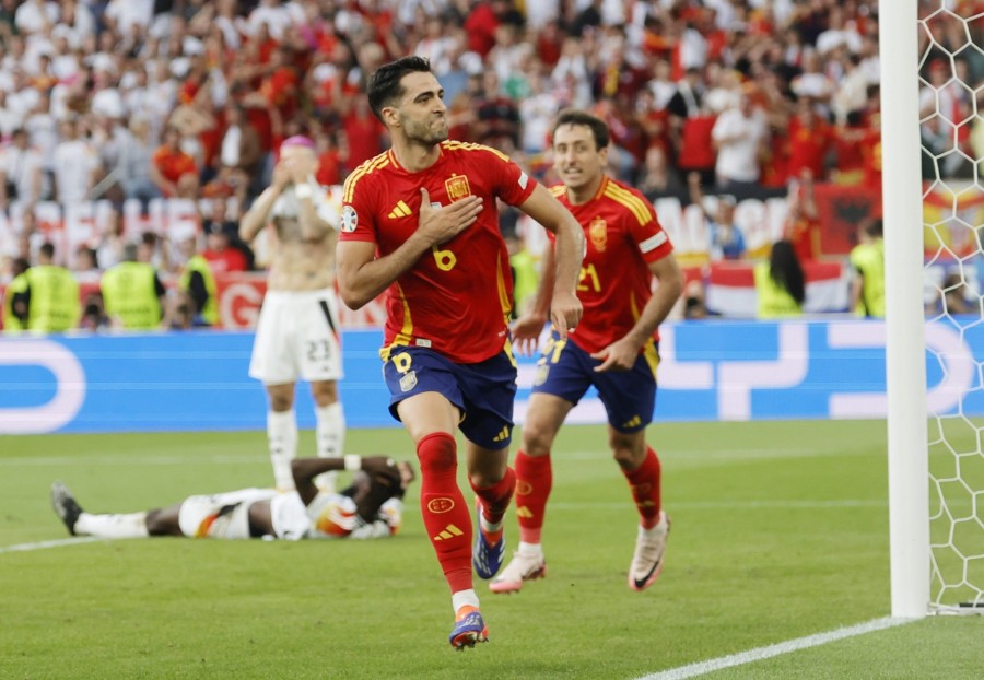 Fotó: epa11460412 Mikel Merino of Spain celebrates scoring the 2-1 goal during the UEFA EURO 2024 quarter-finals soccer match between Spain and Germany, in Stuttgart, Germany, 05 July 2024. EPA/RONALD WITTEK